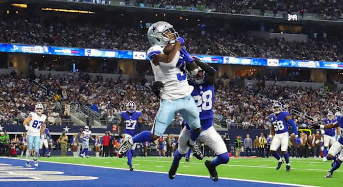 Brandin Cooks (3) scores one of Dallas' seven touchdowns on Sunday afternoon